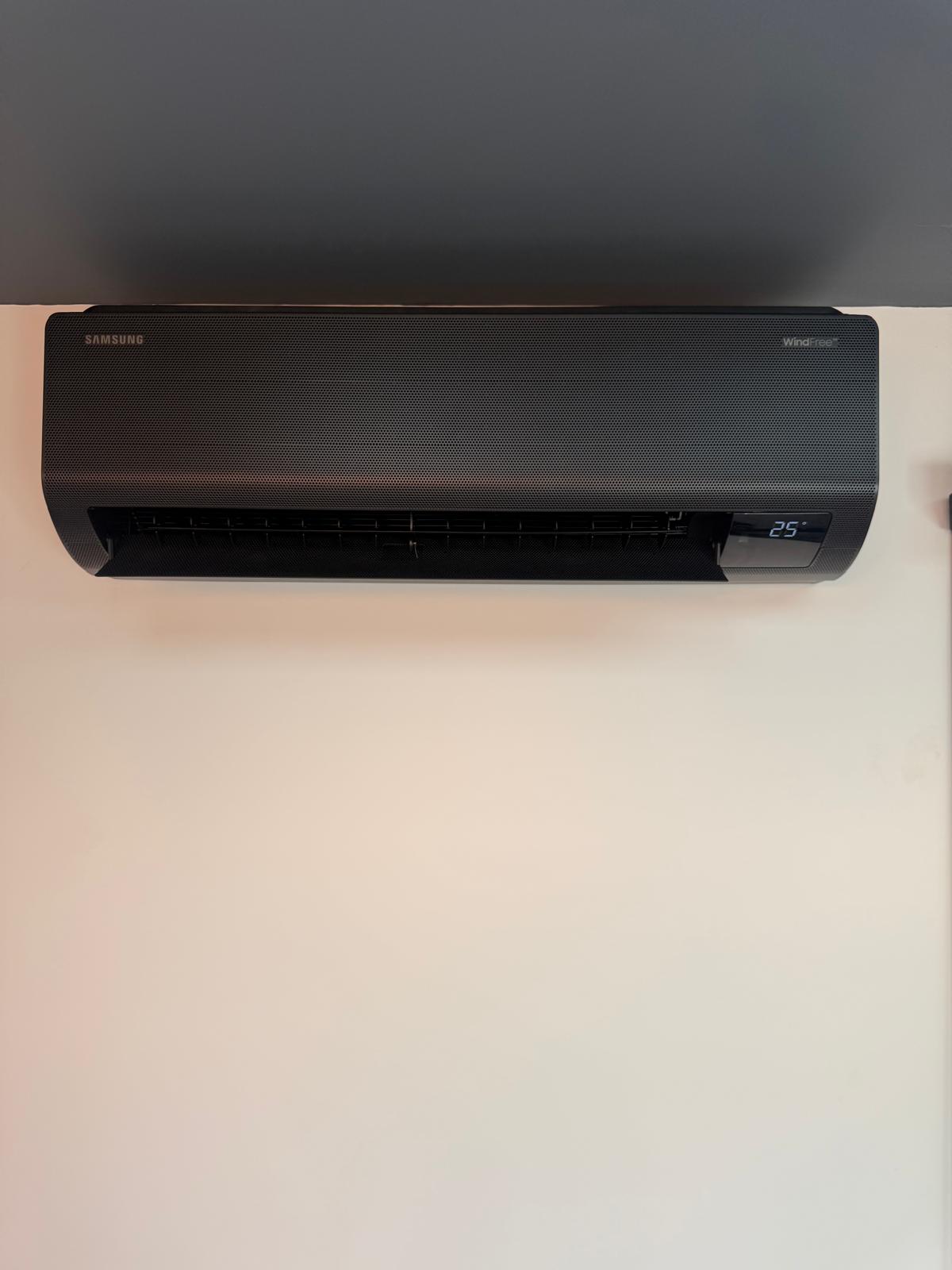 Modern wall-mounted air conditioning unit in a home