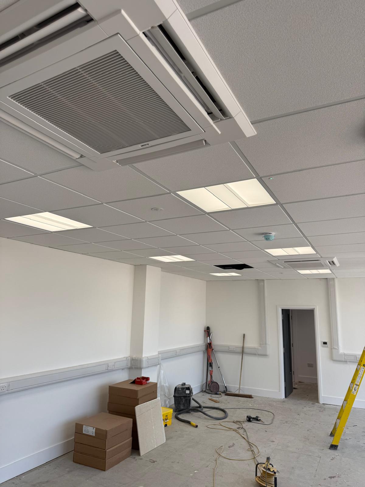 Ceiling cassette air conditioning unit installed in a commercial office